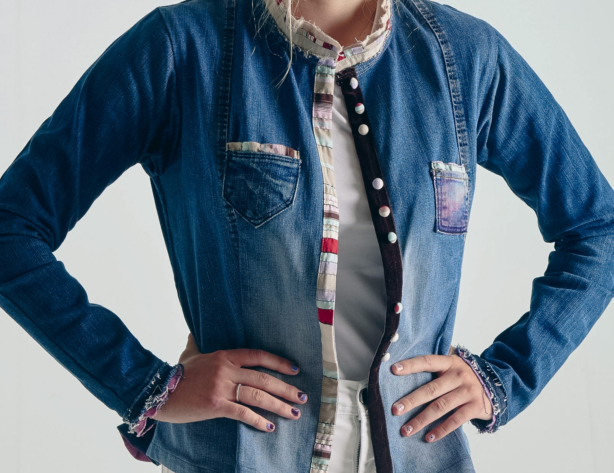 patched denim jacket — close up on buttons and lining